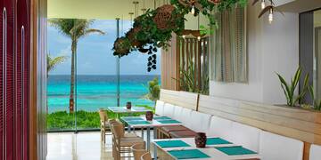 a restaurant with a view of the ocean