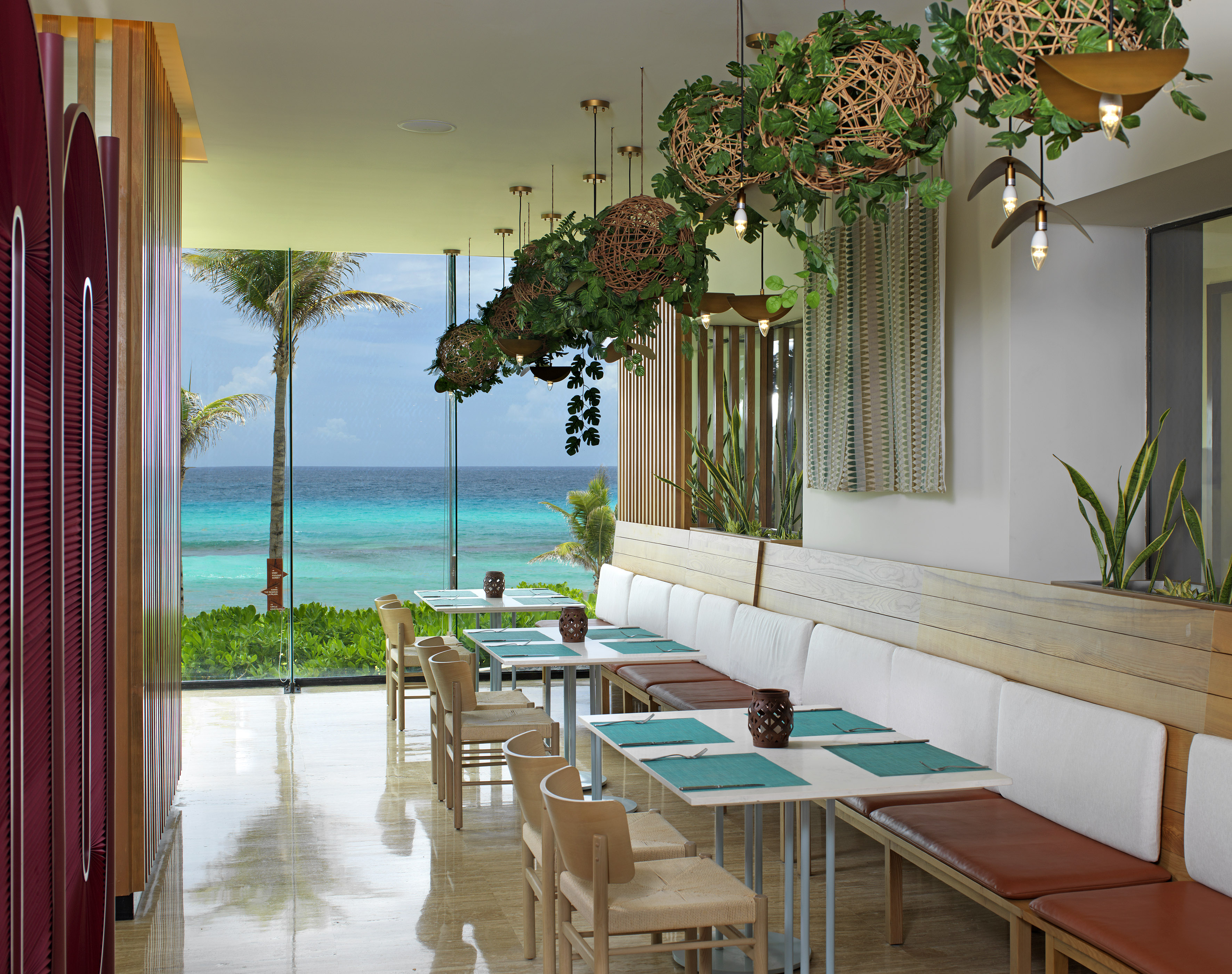 a restaurant with a view of the ocean