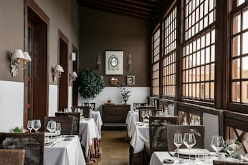 a restaurant with tables and chairs