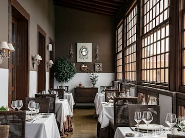 a restaurant with tables and chairs