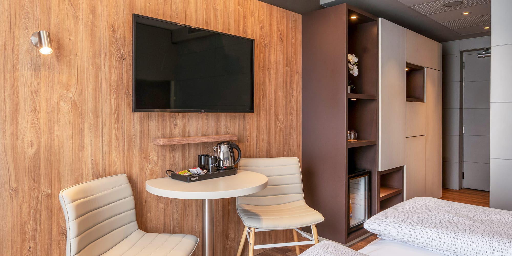 a room with a tv and a table