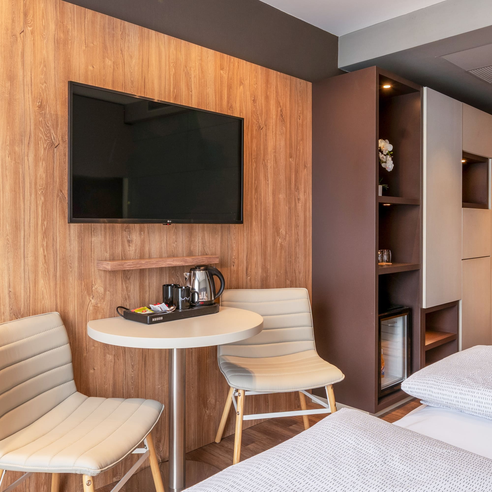 a room with a tv and a table