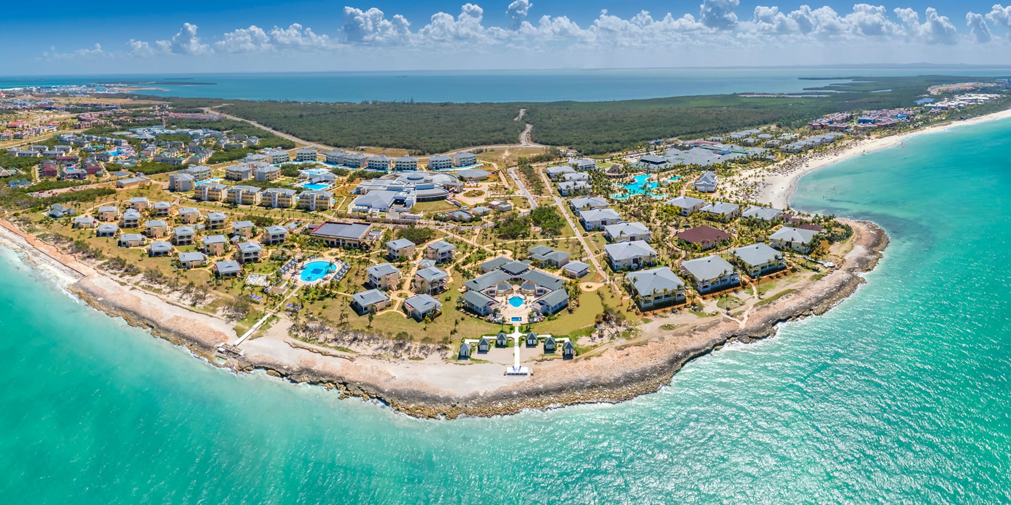 a group of buildings on a small island