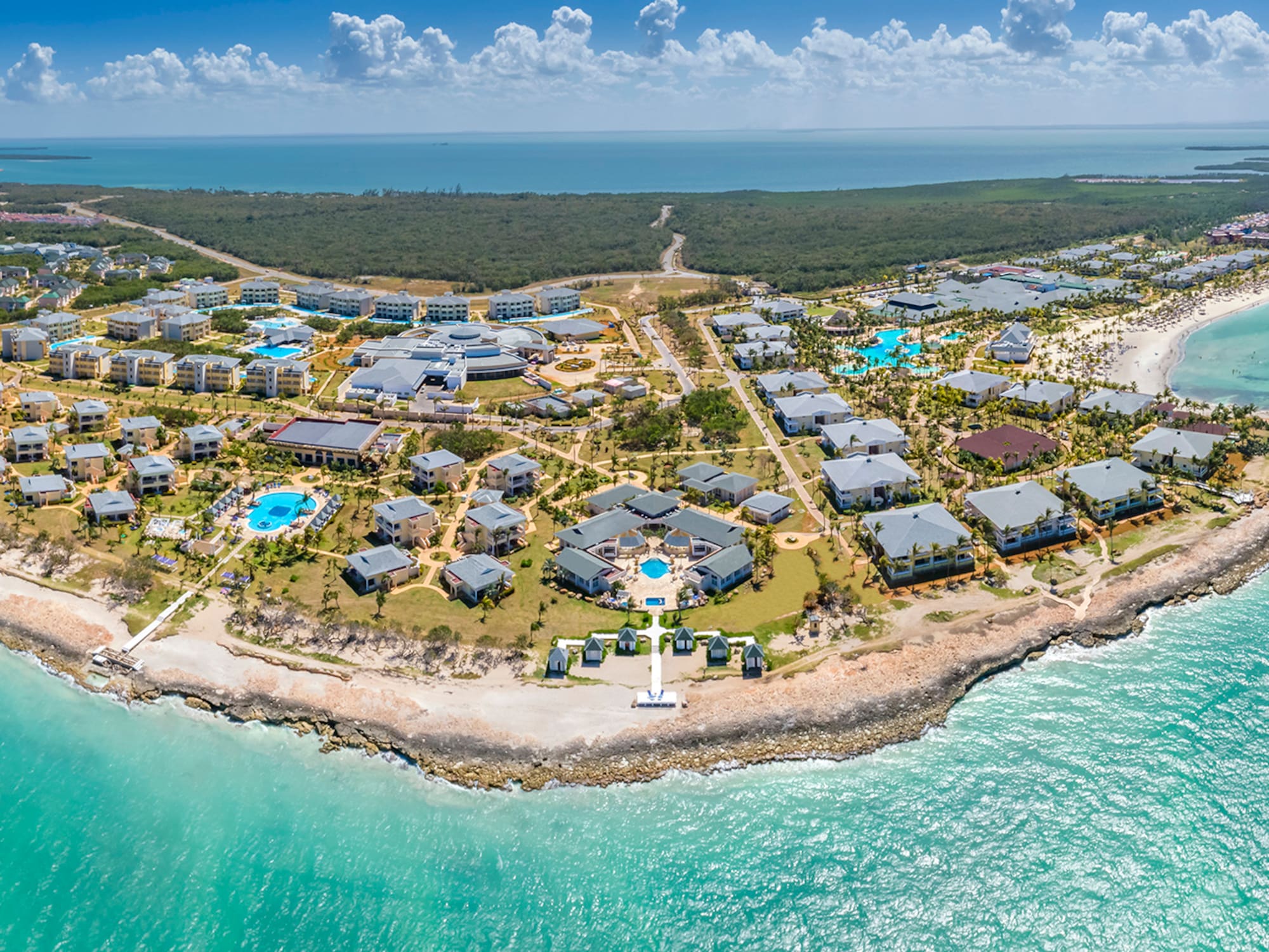 a group of buildings on a small island