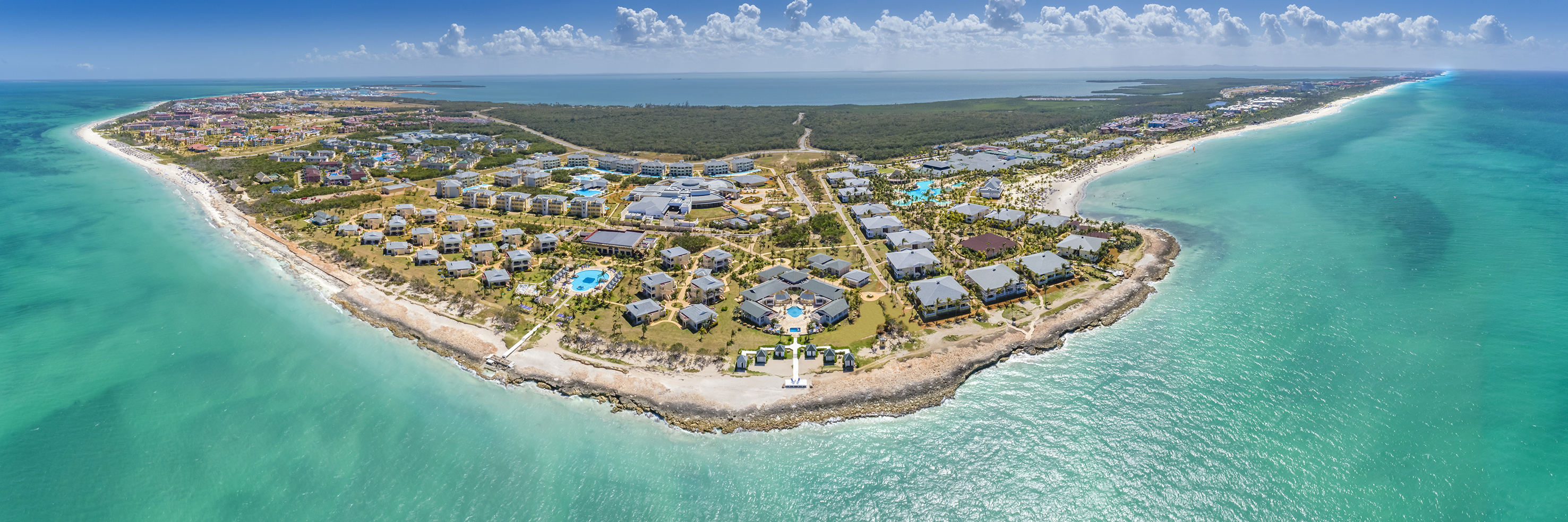 a group of buildings on a small island