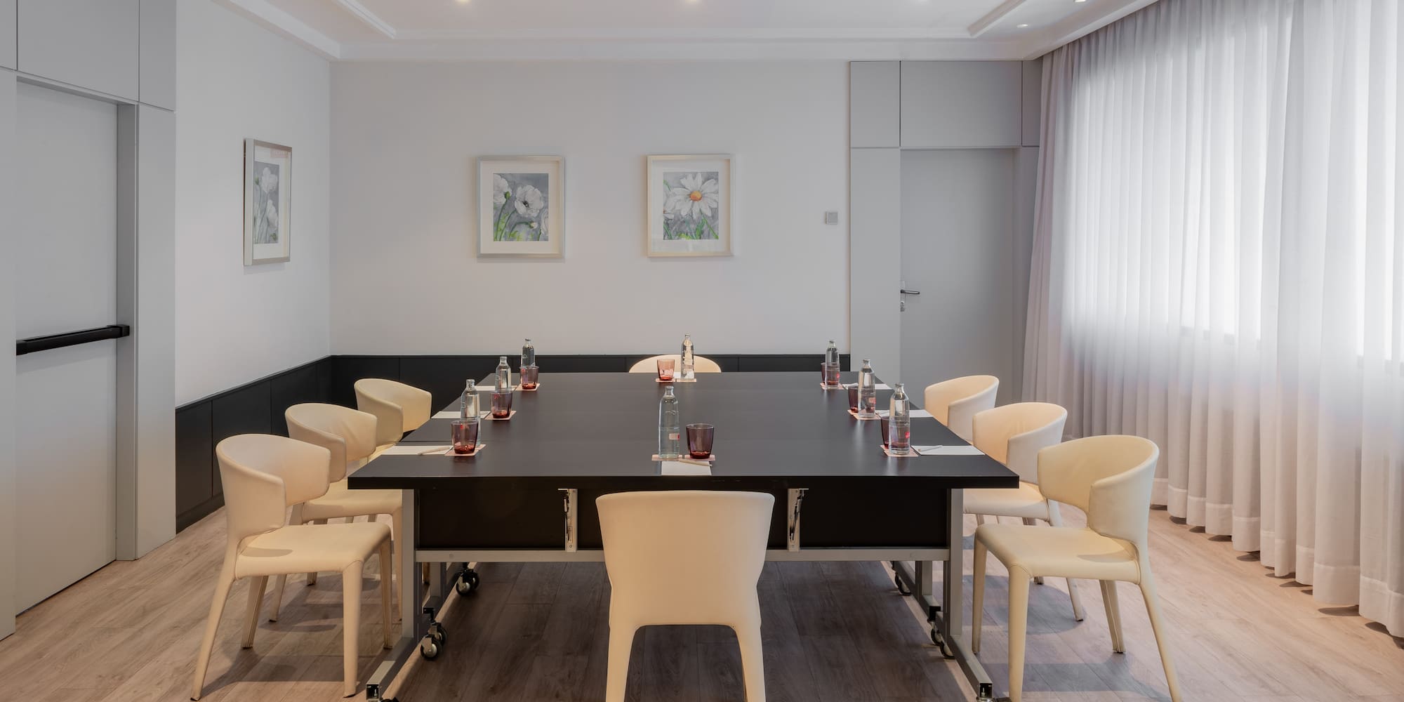 a room with a table and chairs