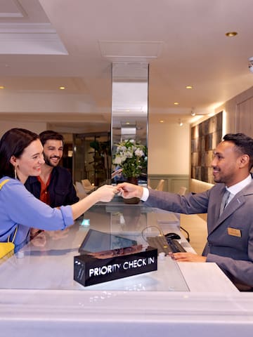 a man and woman at a desk