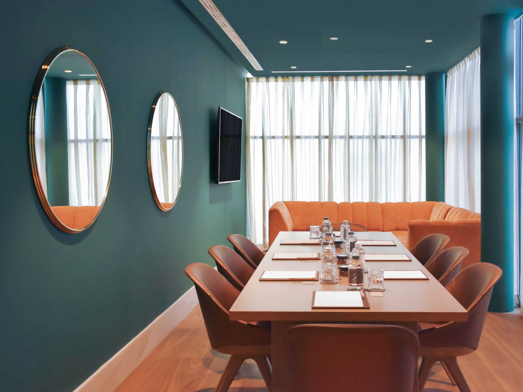 a room with a table and chairs