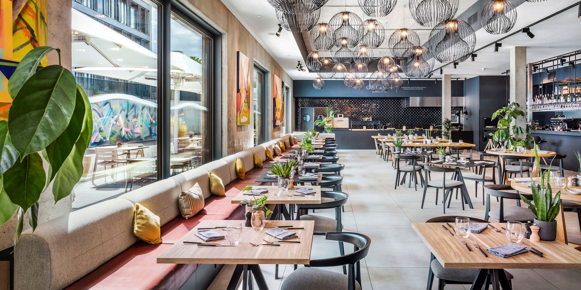 a restaurant with tables and chairs