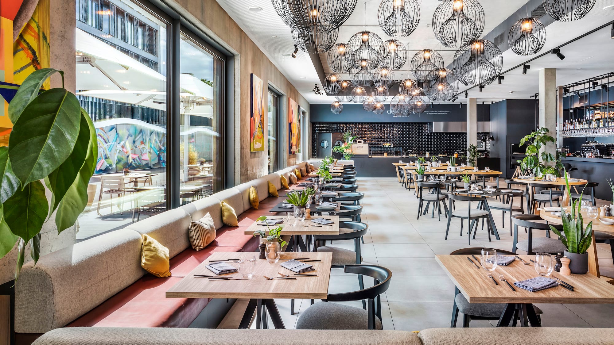 a restaurant with tables and chairs