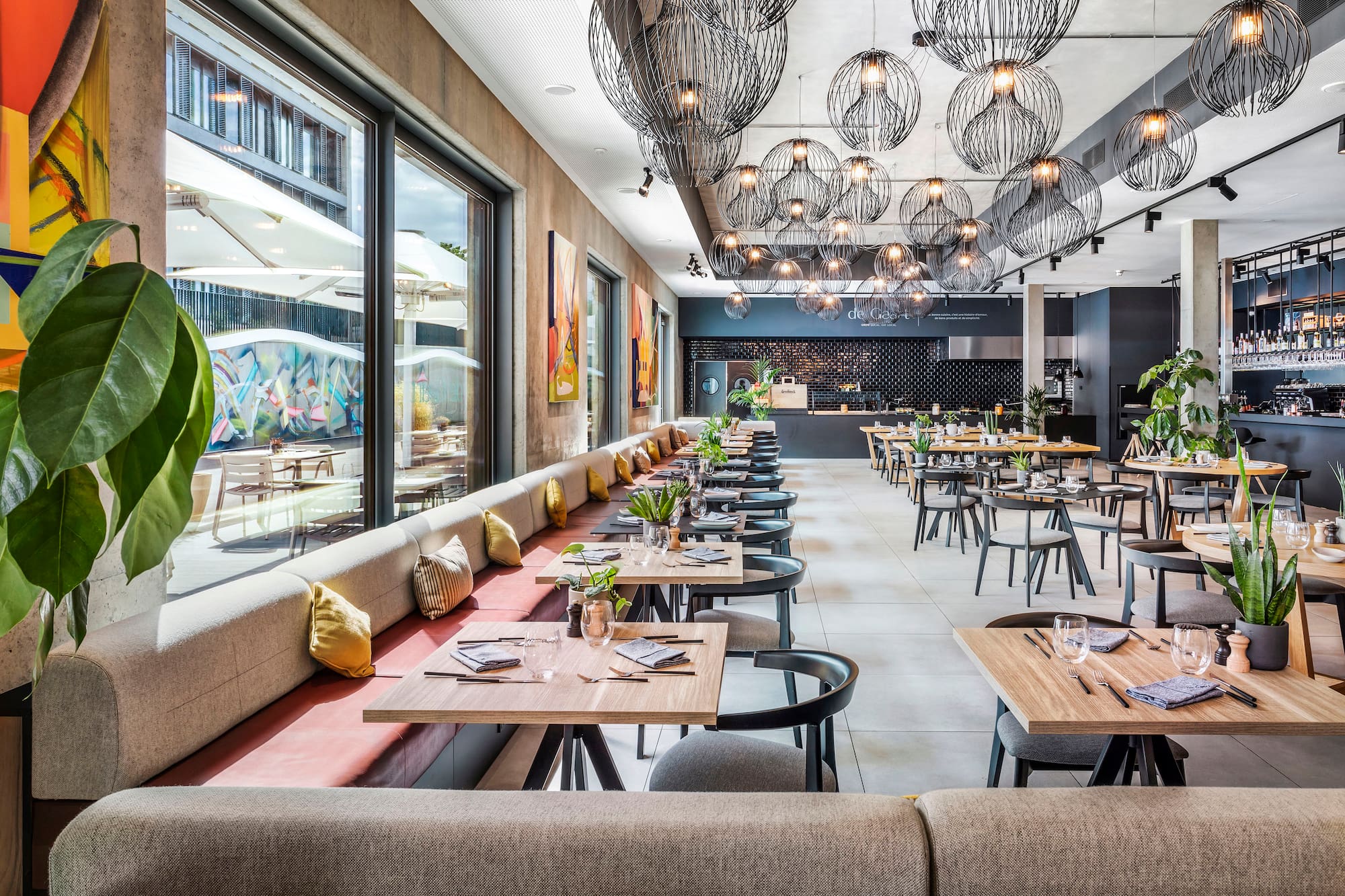 a restaurant with tables and chairs