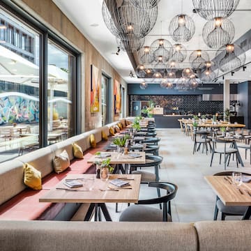 a restaurant with tables and chairs