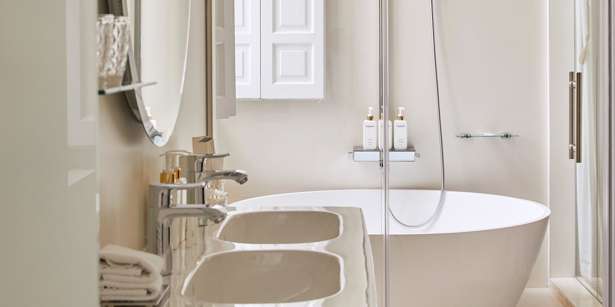 a bathroom with a tub and sink