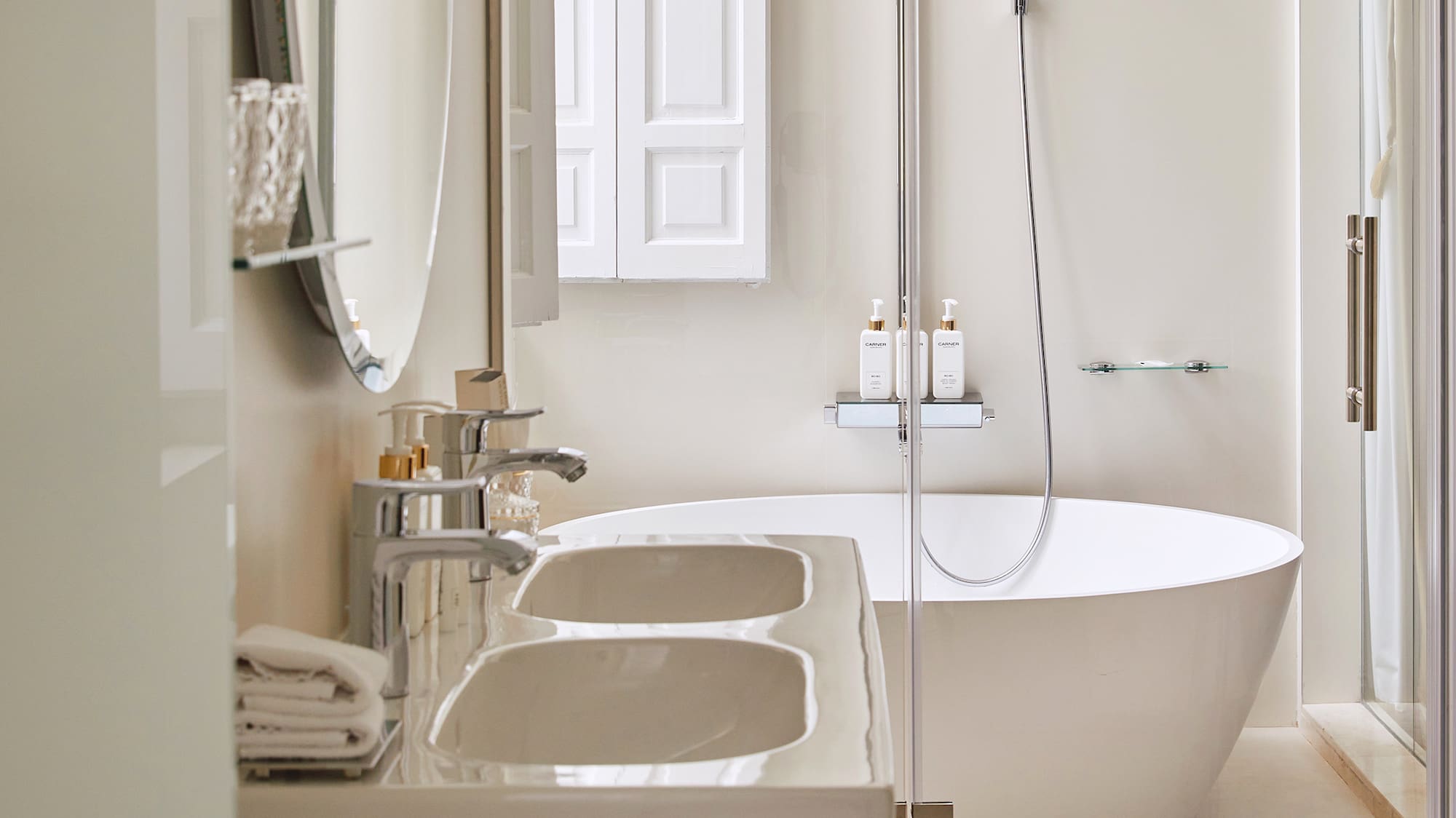 a bathroom with a tub and sink