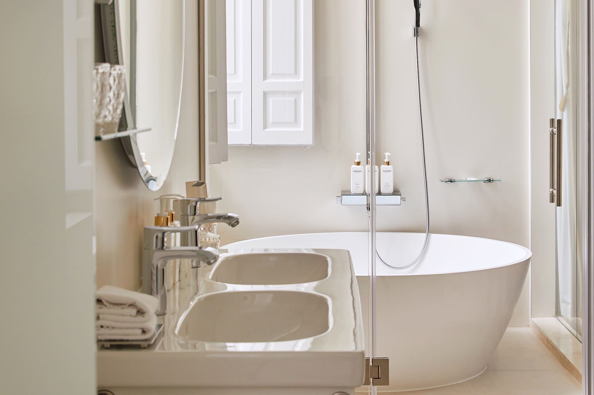 a bathroom with a tub and sink
