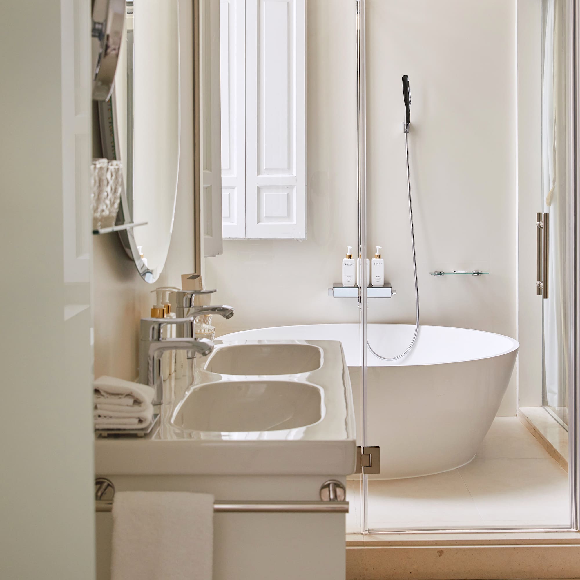 a bathroom with a tub and sink