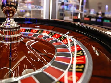 a roulette wheel with a ball on it