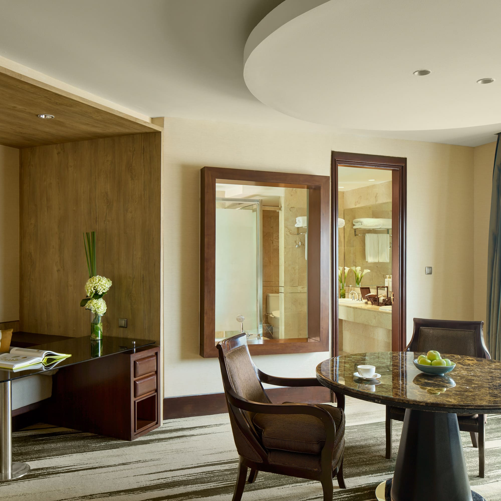 a room with a table and chairs