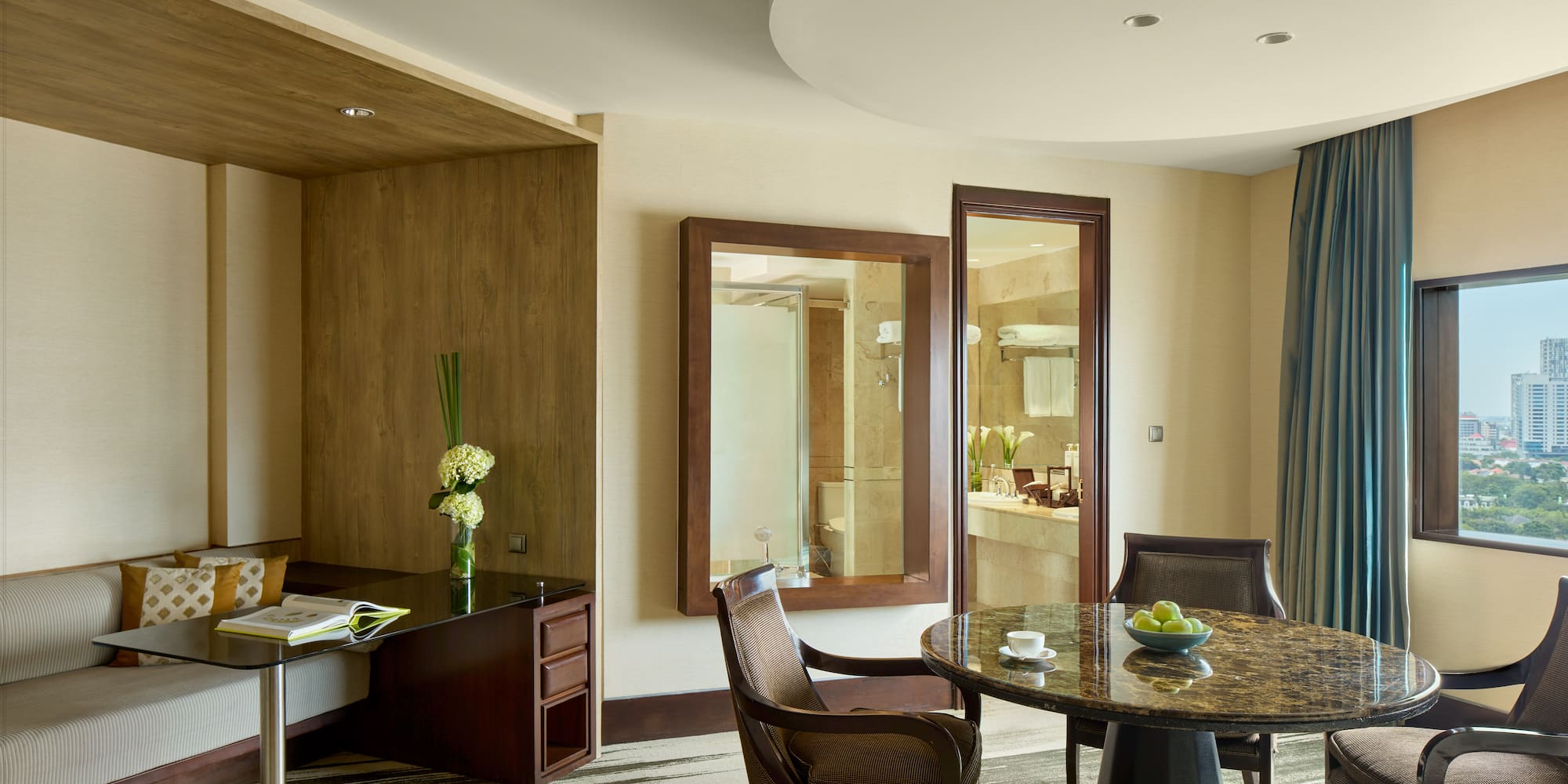 a room with a table and chairs