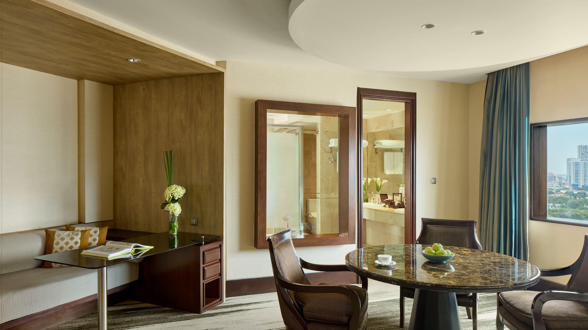 a room with a table and chairs