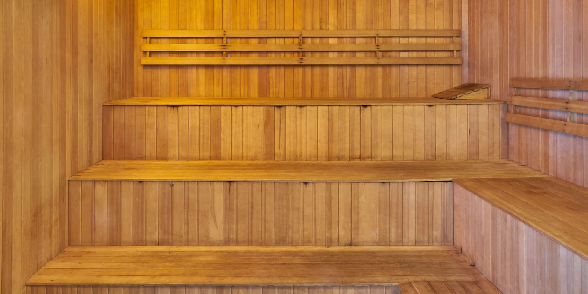 a wooden sauna with wooden benches