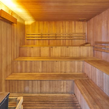 a wooden sauna with wooden benches