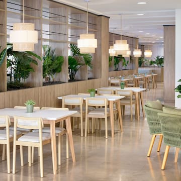 a room with tables and chairs