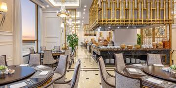 a restaurant with tables and chairs