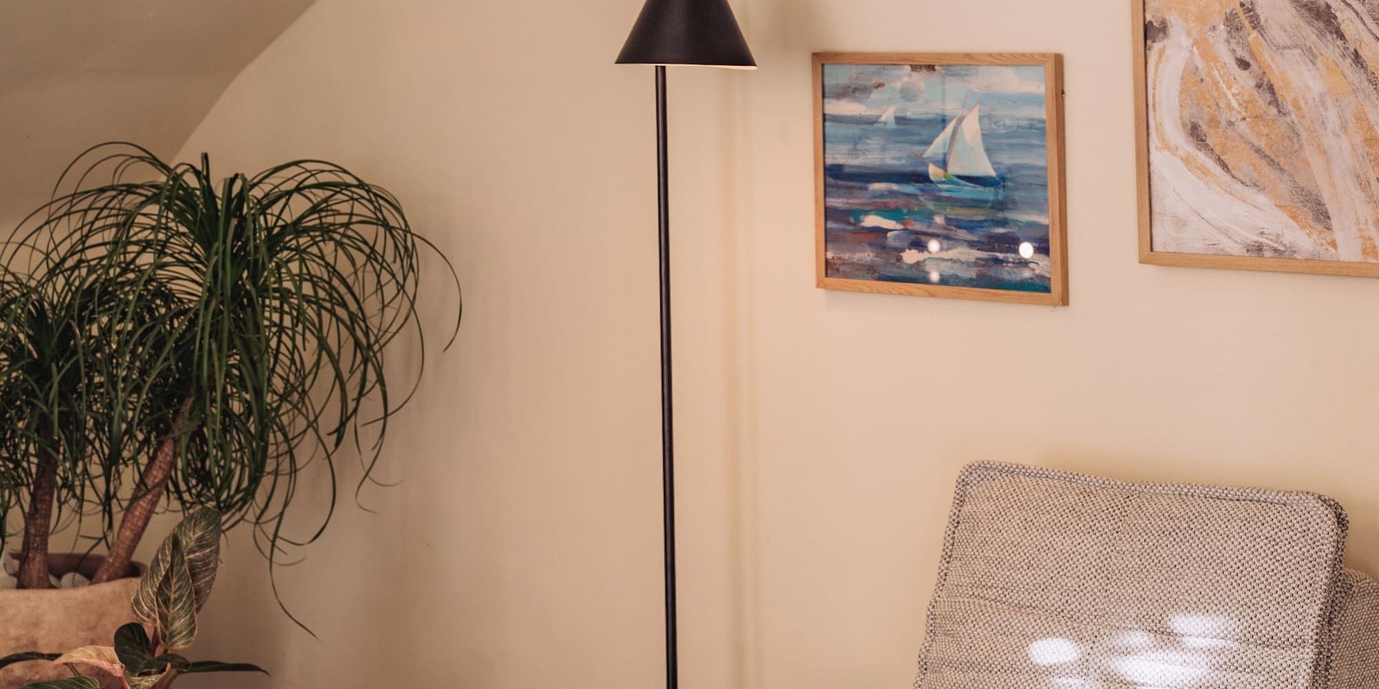 a couch and a lamp in a room