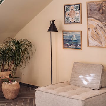 a couch and a lamp in a room