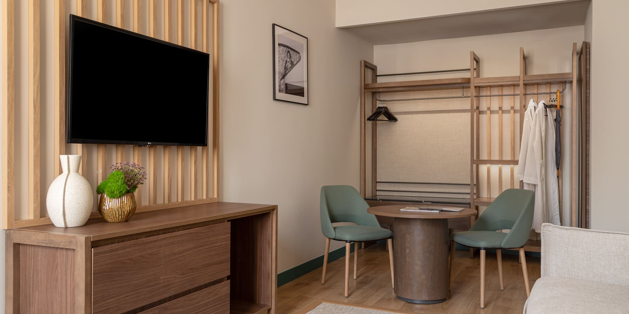 a room with a tv and a table