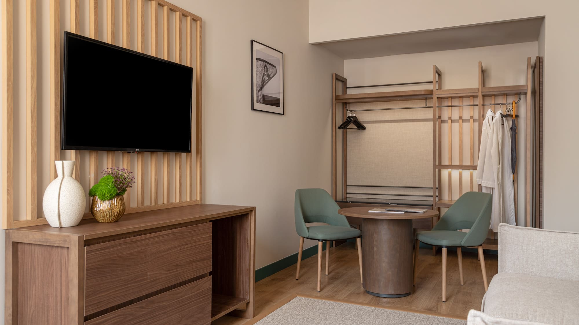 a room with a tv and a table