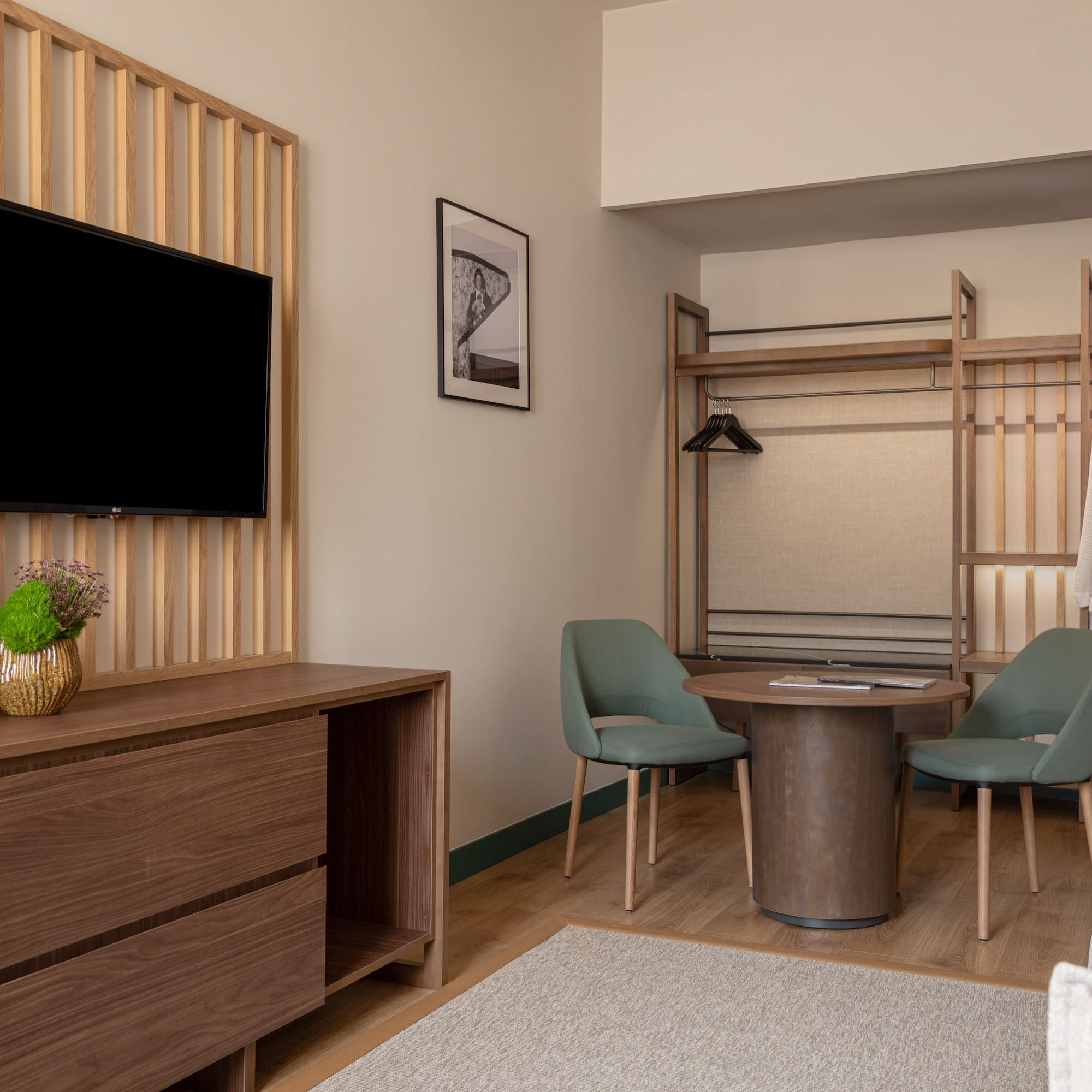 a room with a tv and a table