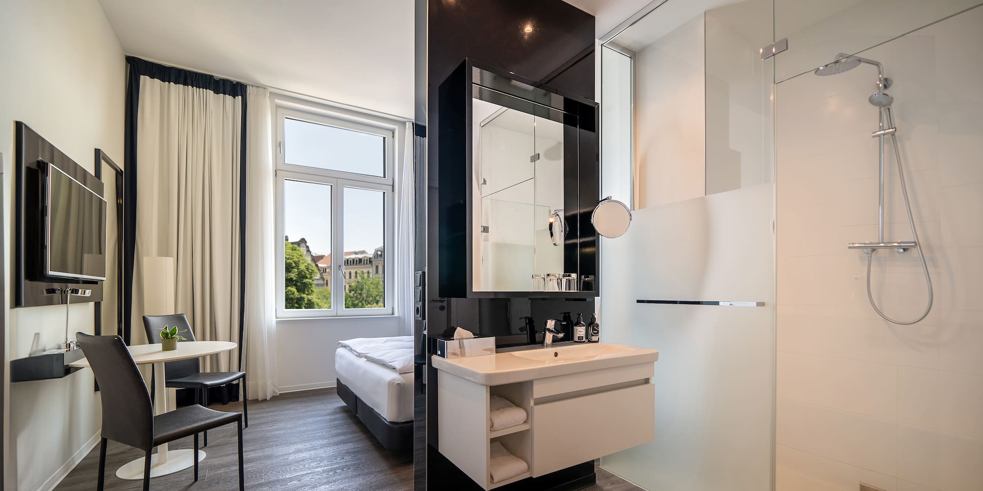 a bathroom with a shower and a bed