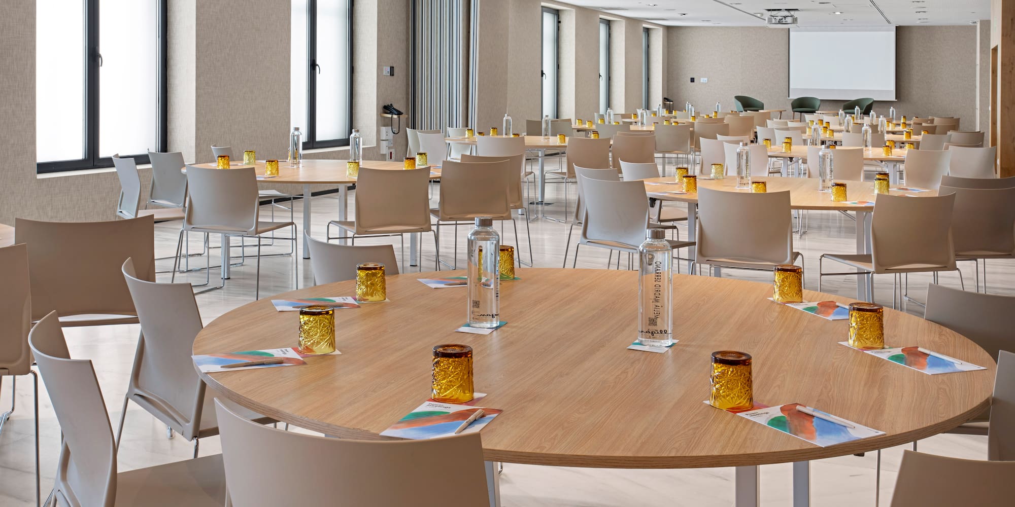 a room with tables and chairs