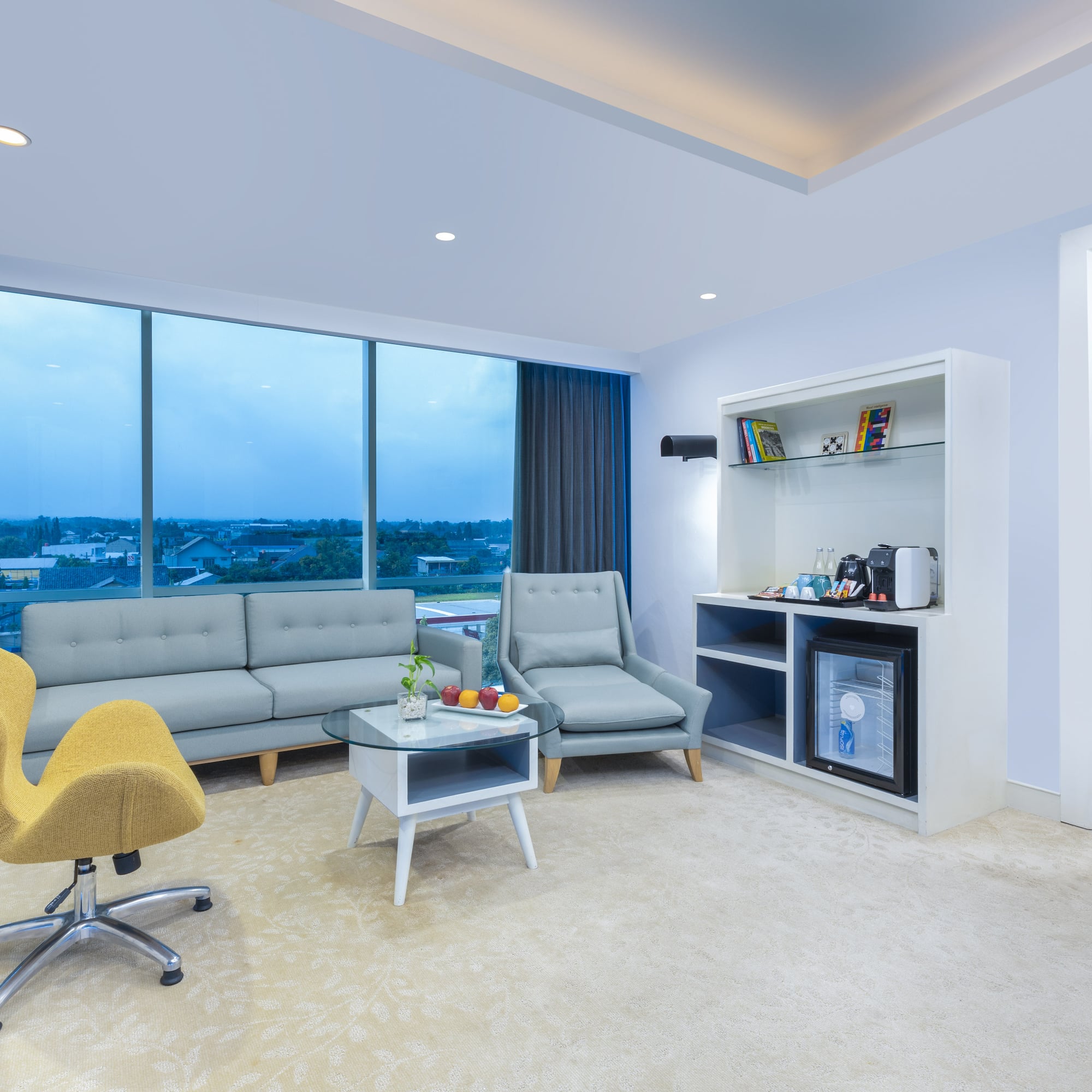 a room with a couch and a coffee table