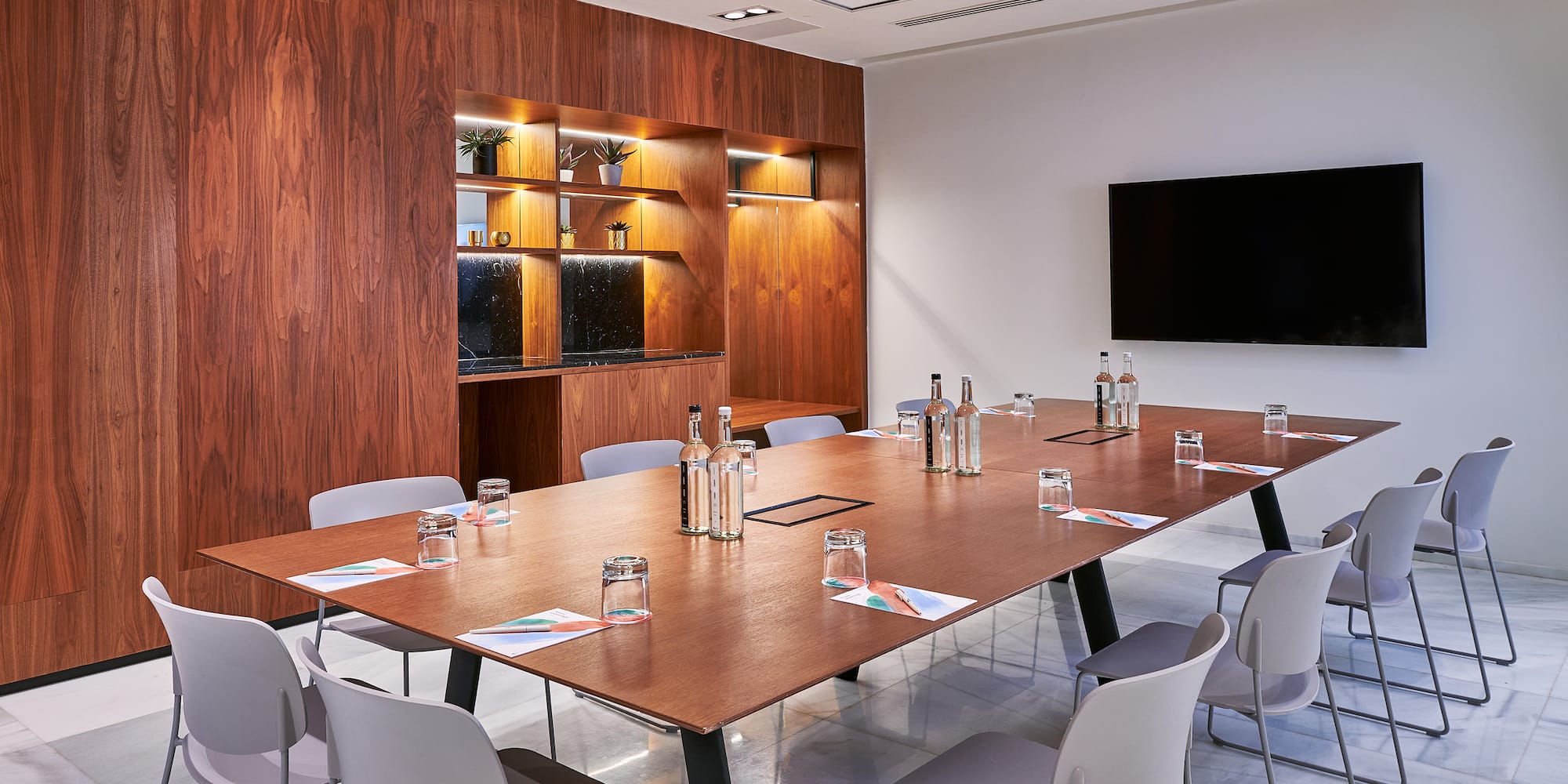 a room with a table and chairs