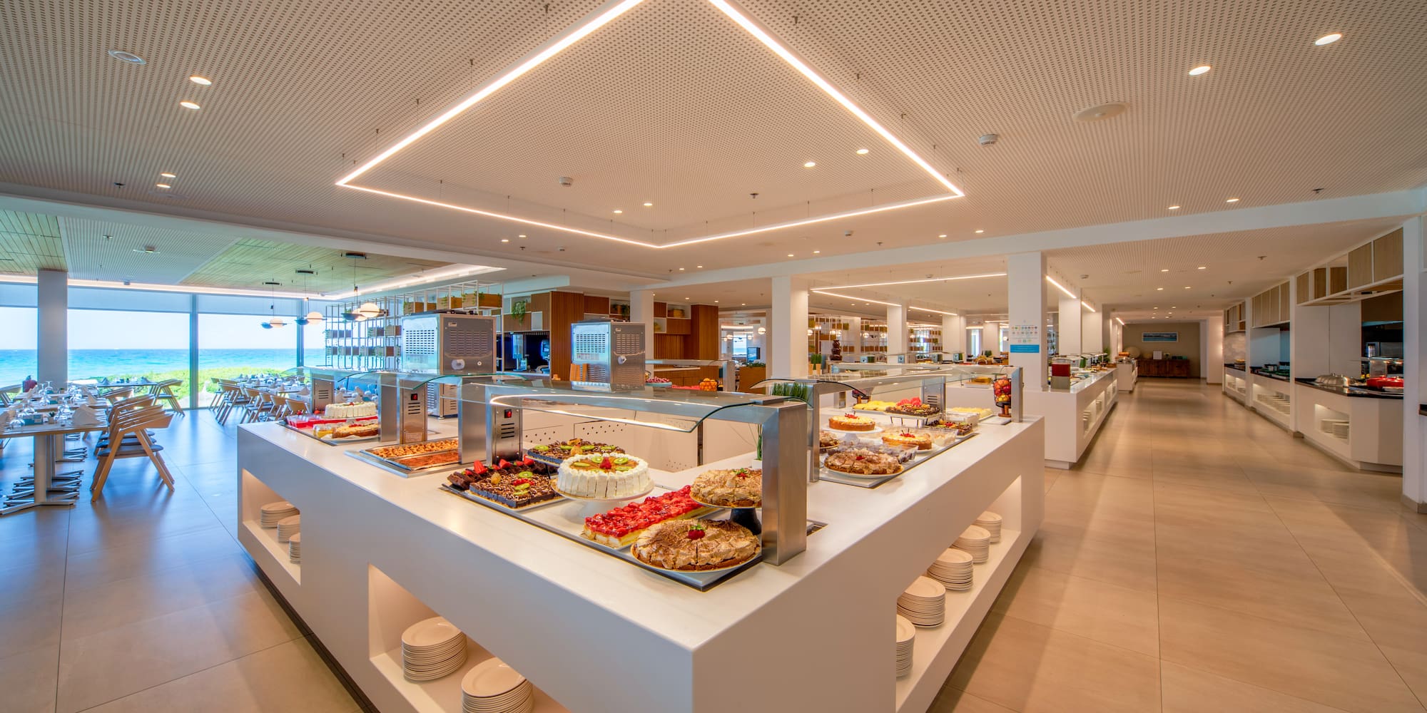 a buffet line with food on the counter