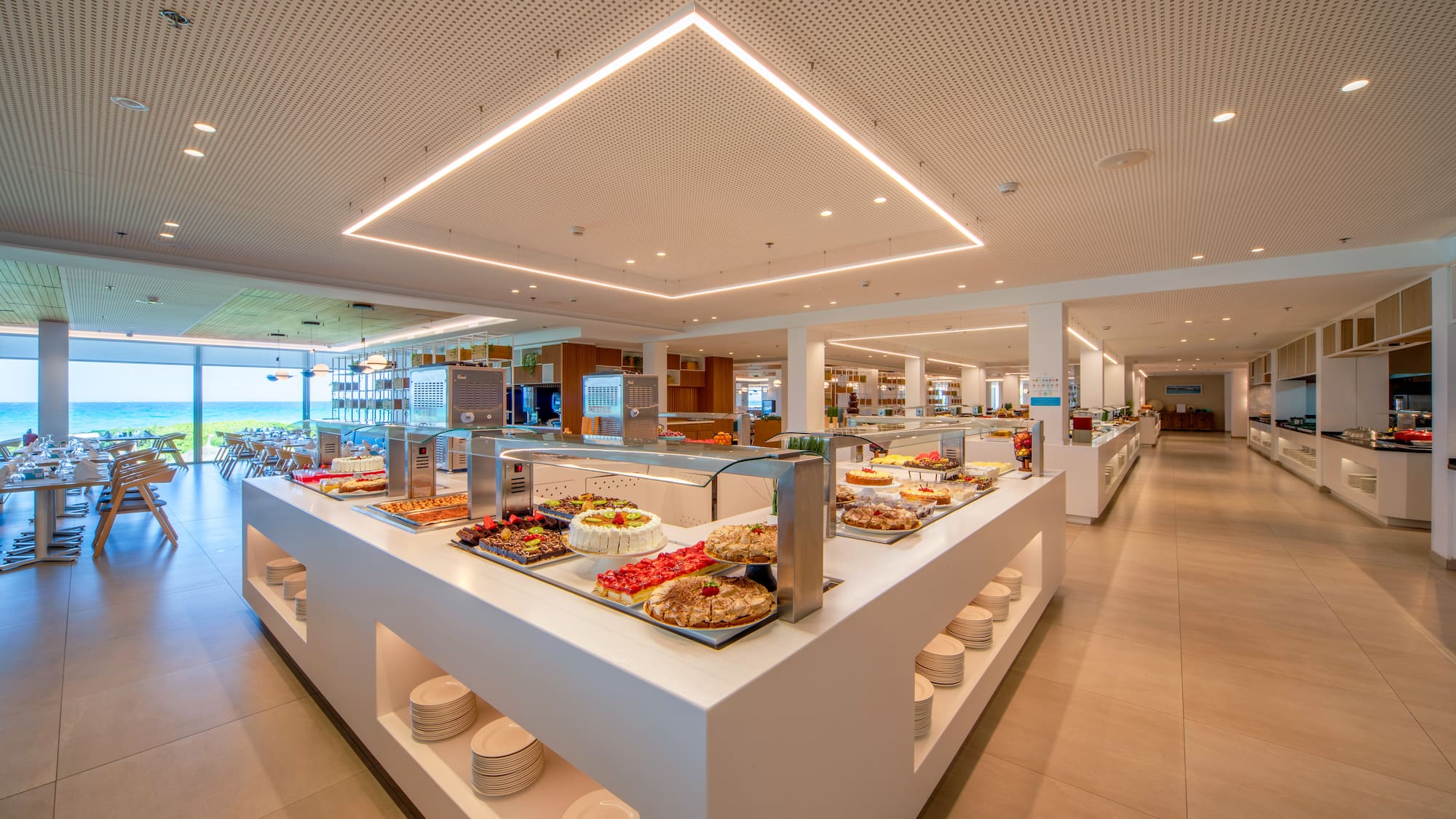 a buffet line with food on the counter