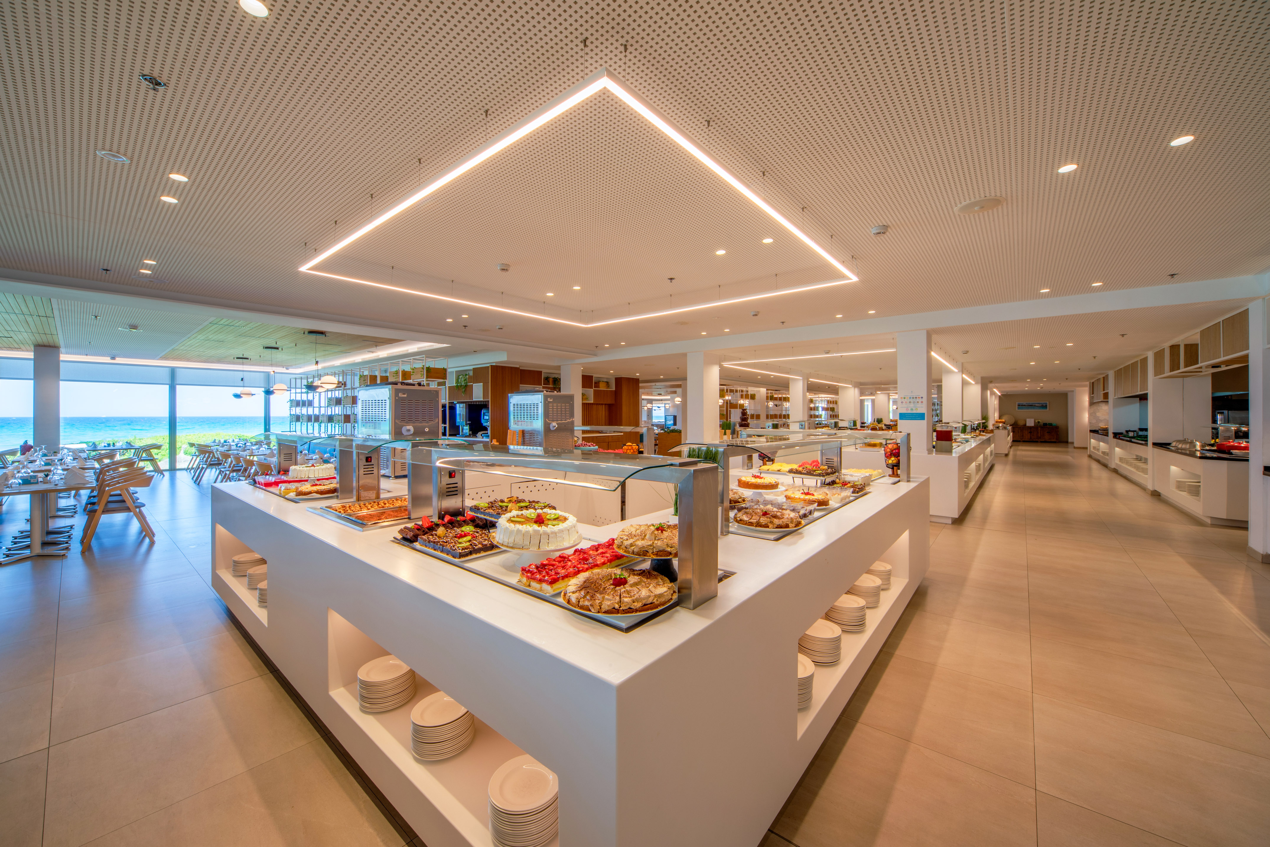 a buffet line with food on the counter