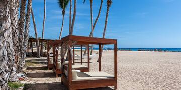a group of beds on a beach