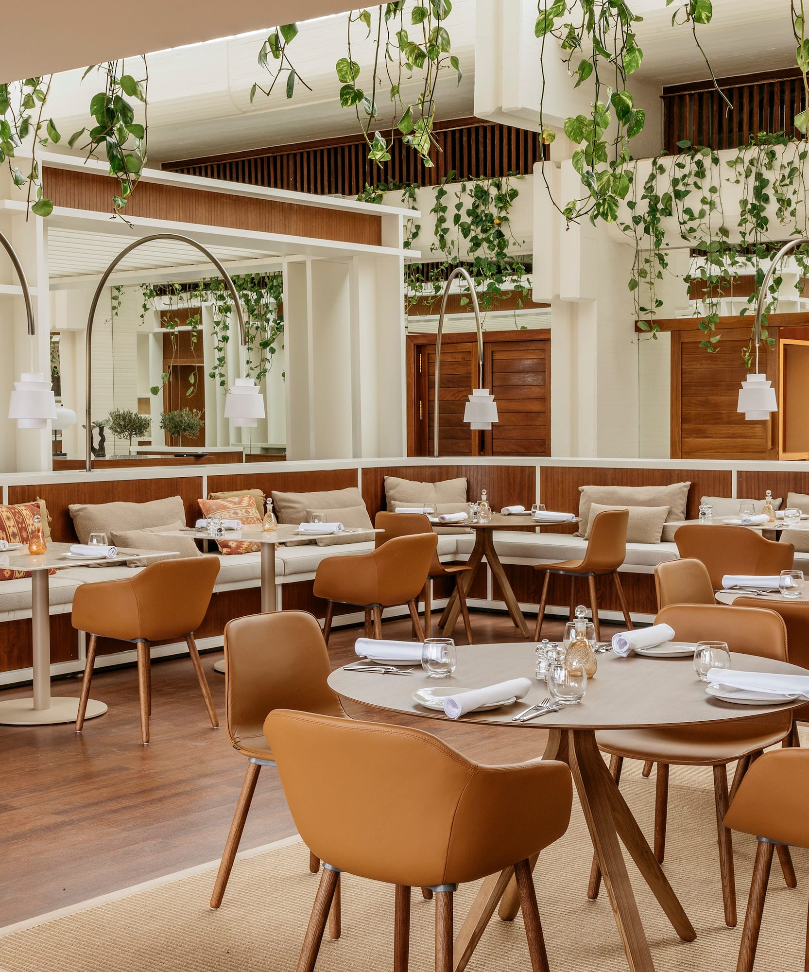 a restaurant with tables and chairs