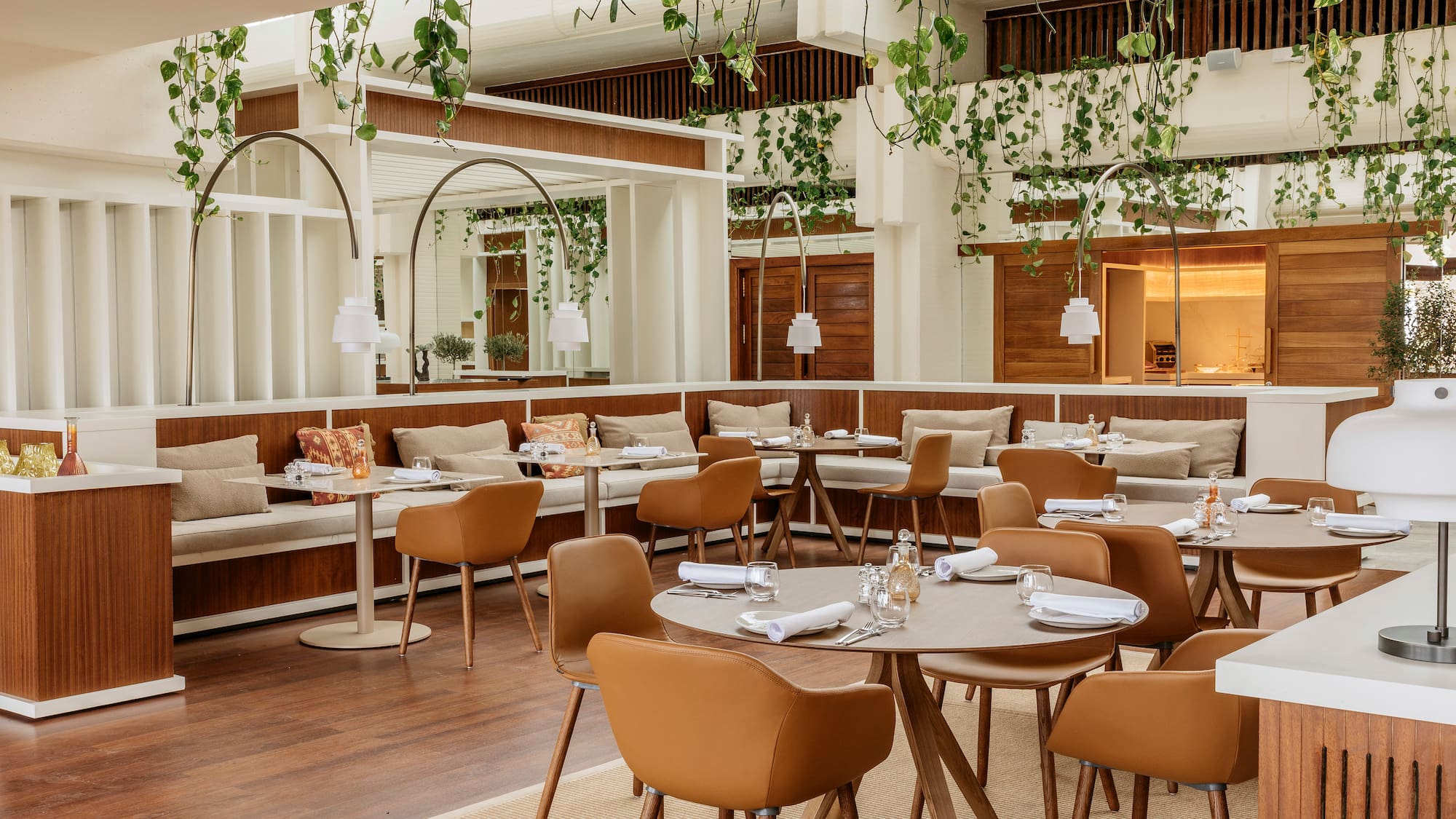 a restaurant with tables and chairs