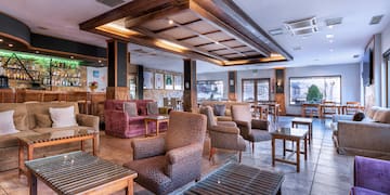 a room with chairs and tables