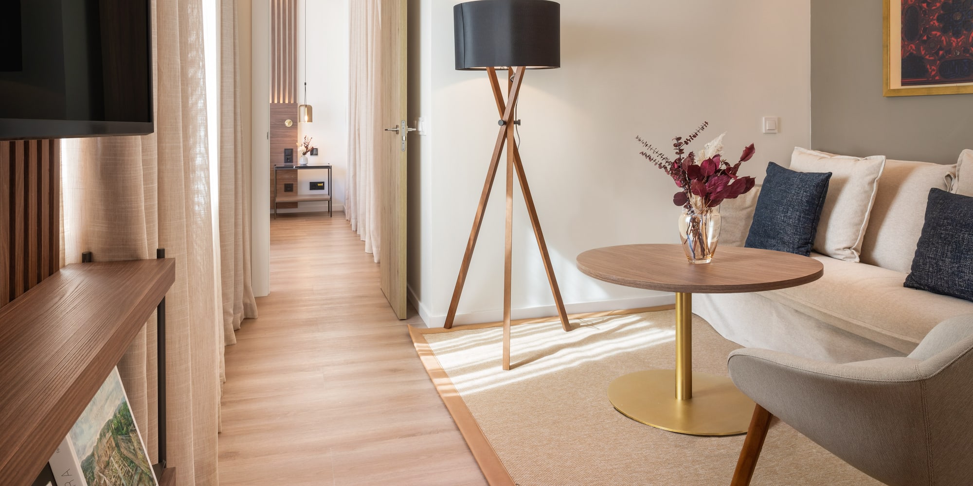 a room with a table and a lamp