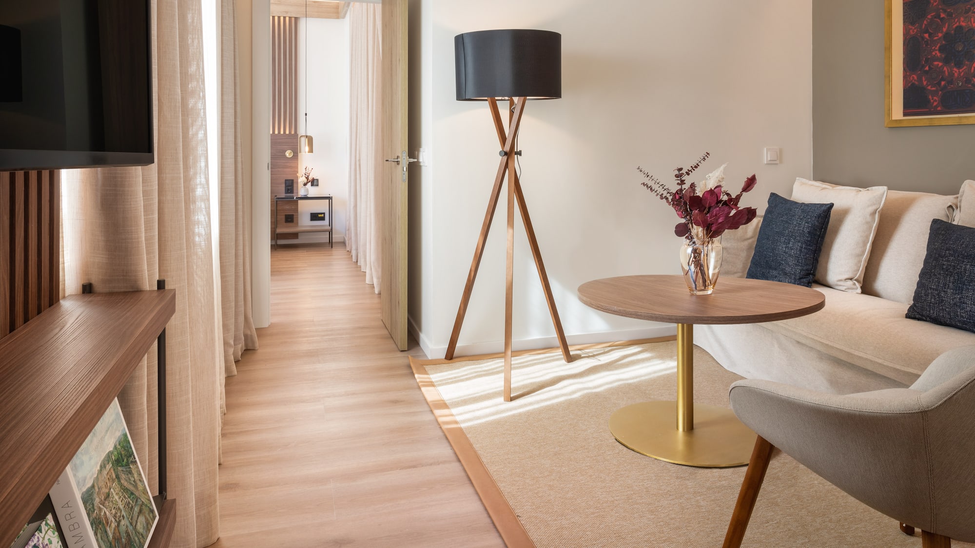 a room with a table and a lamp