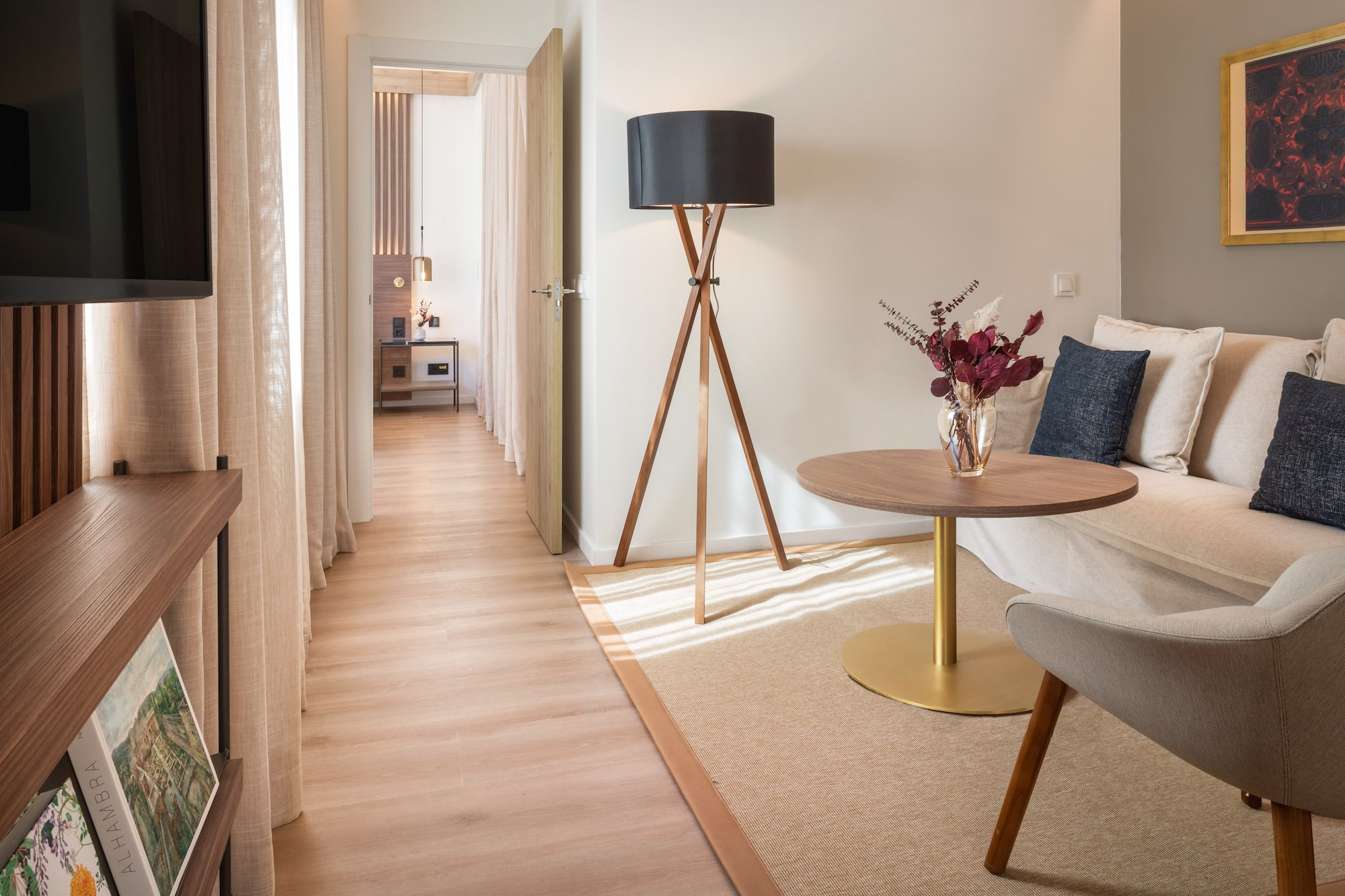 a room with a table and a lamp