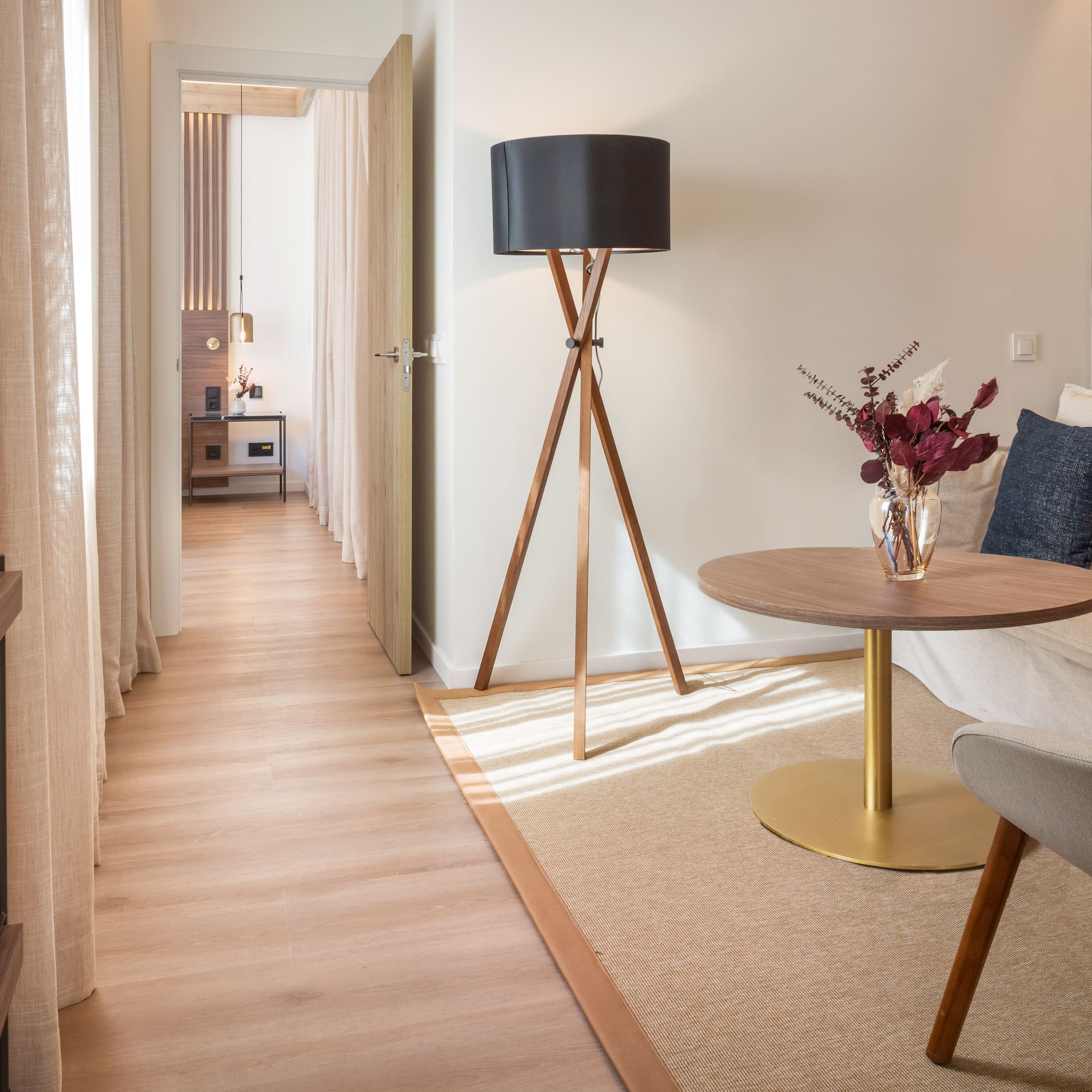 a room with a table and a lamp