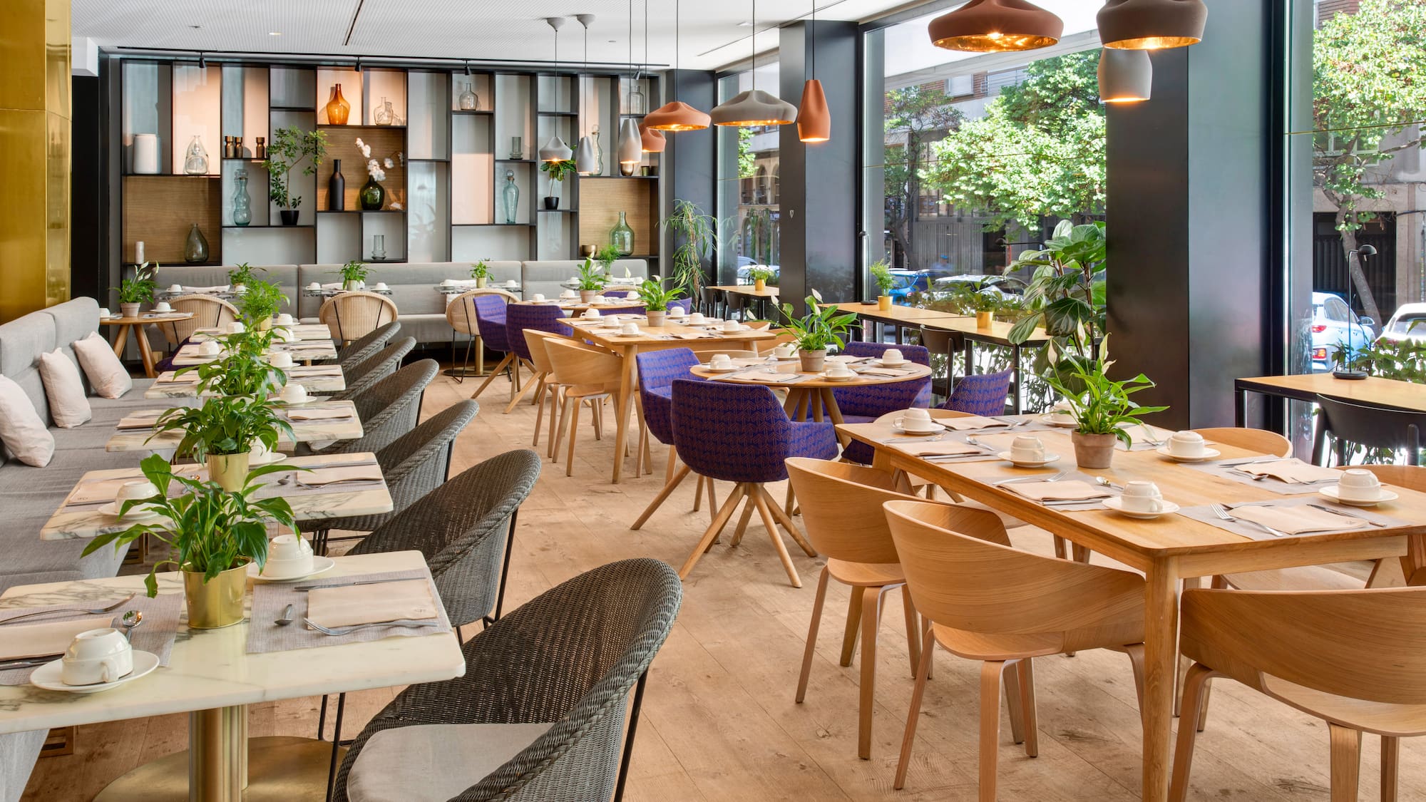 a restaurant with tables and chairs