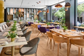 a restaurant with tables and chairs